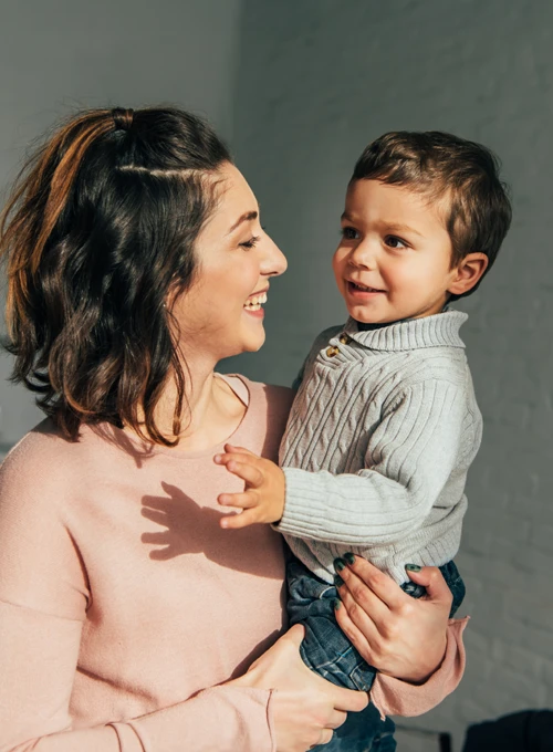 Chiropractic Hastings MI Mother Holding Son